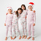 4 models posing, 2 with Santa hats
2 models wearing Christmas, festive, Santa, Elves, Classic Christmas, Holiday, Ornaments, Stockings, Gingerbread, Red Trucks pajama set / 2 models wearing hand drawn red stripes pajama set  
Pajamas are white, lightweight fabric with a vibrant Christmas print.   Pajamas are long-sleeved and made from GOTS certified, 100% organic cotton.
good morning monsters pajamas, loungewear, sleepwear, pajamas, boys, girls, baby, unisex