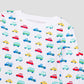 View of Pajama Set - Close up of vehicles print (with colorful cars,  buses, jeeps & vans,  and blue GMM logos). 
 Pajamas are white fabric with a vibrant vehicles print.  Pajamas are long-sleeved and made from 100% GOTS certified organic cotton.
good morning monsters pajamas, loungewear, sleepwear, pajamas, boys, girls, baby, unisex