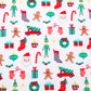 Close up of print, Christmas, festive, Santa, Elves, Classic Christmas, Holiday Ornaments, Stockings, Gingerbread, Red Trucks, pajama set.  
Pajamas are white, lightweight fabric with a vibrant Christmas print.   Pajamas are long-sleeved and made from GOTS certified, 100% organic cotton.
good morning monsters pajamas, loungewear, sleepwear, pajamas, boys, girls, baby, unisex