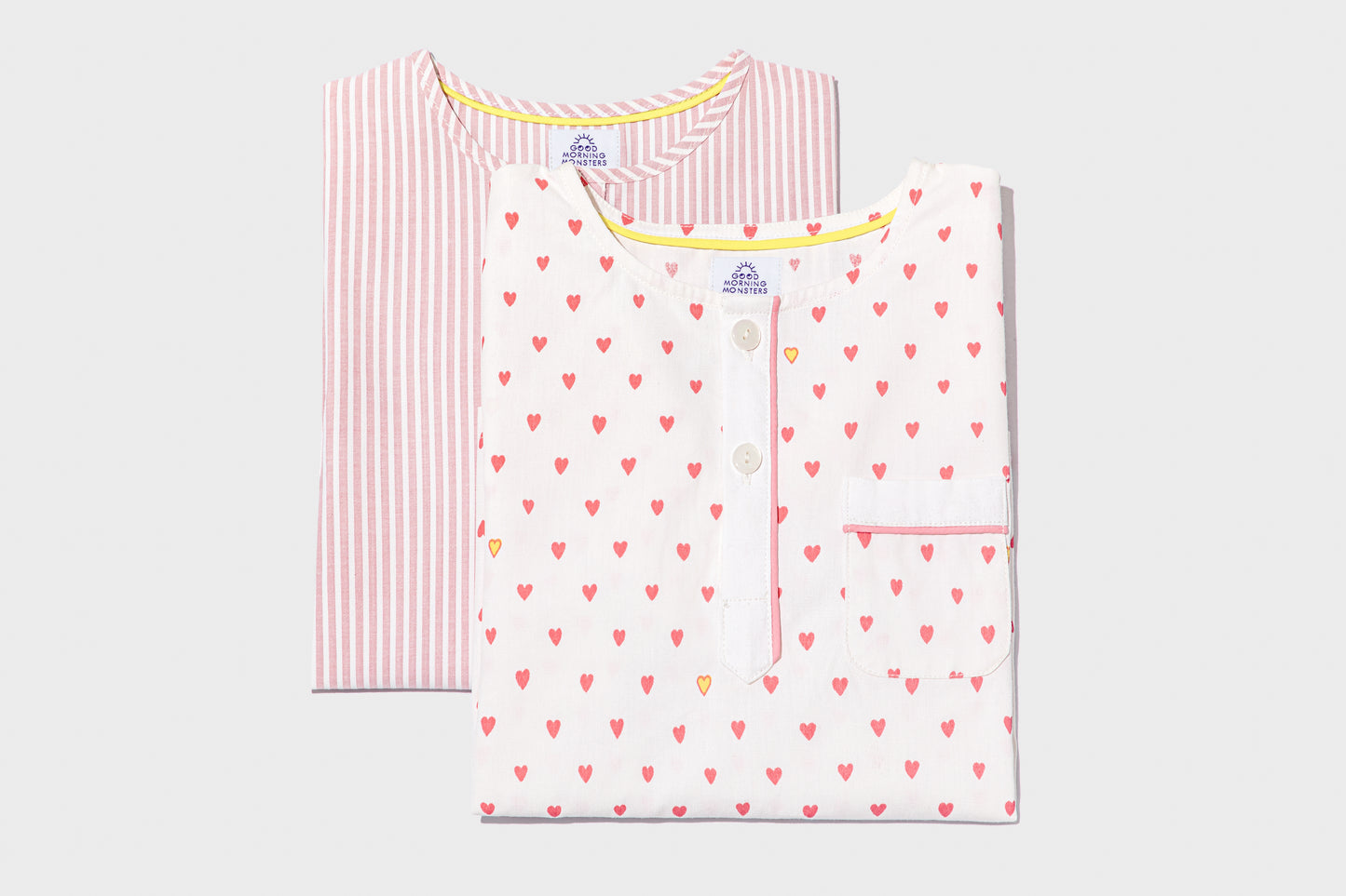 front view of pink striped pajama top and hearts print pajama top, detailed view of front placket; good morning monsters woven pajamas, loungewear, sleepwear, loose-fitting pajamas, boys, girls, baby, unisex