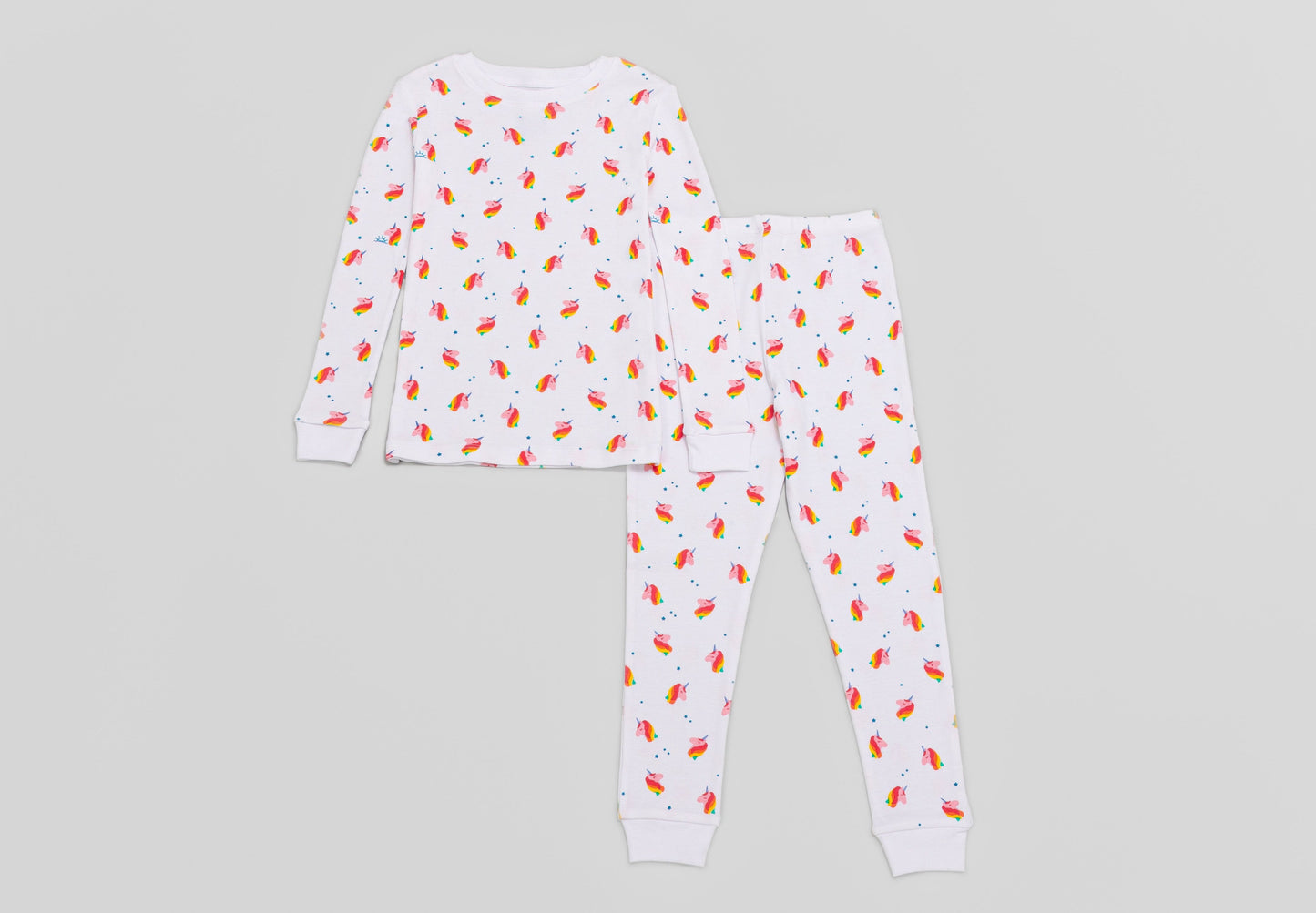 View of Pajama Set - Top & Bottom. 
 Pajamas are white fabric with a vibrant, colorful unicorn print.  Pajamas are long-sleeved and made from GOTS certified, 100% organic cotton.
good morning monsters pajamas, loungewear, sleepwear, pajamas, boys, girls, baby, unisex