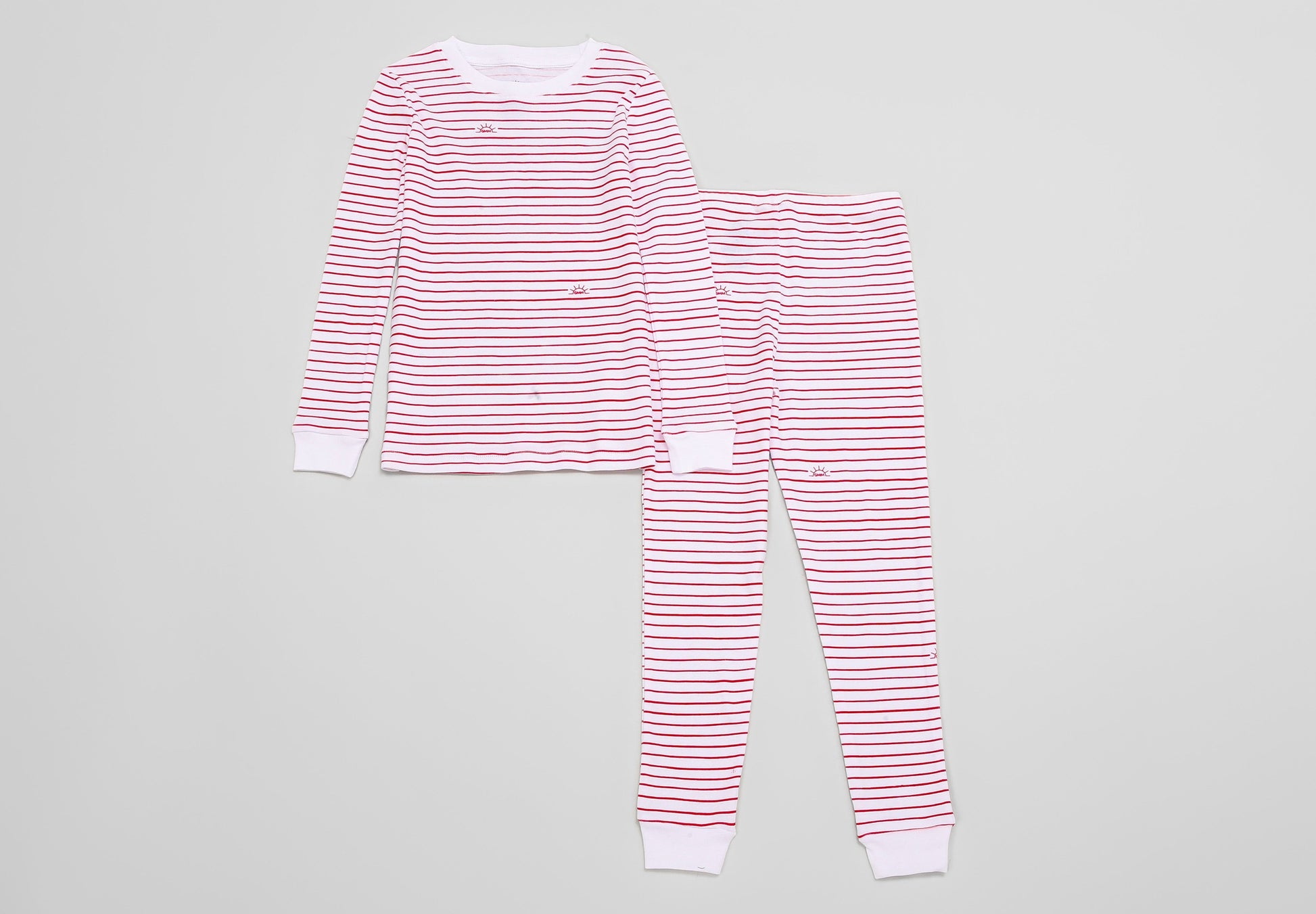 View of Pajama Set - Top & Bottom of red stripes print (with playful red stripes and our GMM logos also in red). 
 Pajamas are white fabric with the red stripes print.  Pajamas are long-sleeved and made from GOTS certified, 100% organic cotton.
good morning monsters pajamas, loungewear, sleepwear, pajamas, boys, girls, baby, unisex