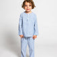 model wearing blue and white pinstripe pajamas, good morning monsters woven pajamas, loungewear, sleepwear, loose-fitting pajamas, boys, girls, baby, unisex